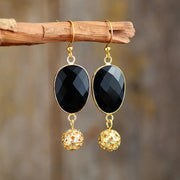 Boucles d'oreilles "Détermination" en Onyx