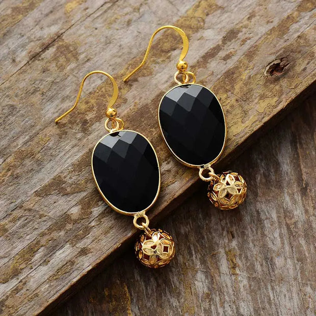 Boucles d'oreilles "Détermination" en Onyx