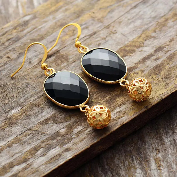 Boucles d'oreilles "Détermination" en Onyx